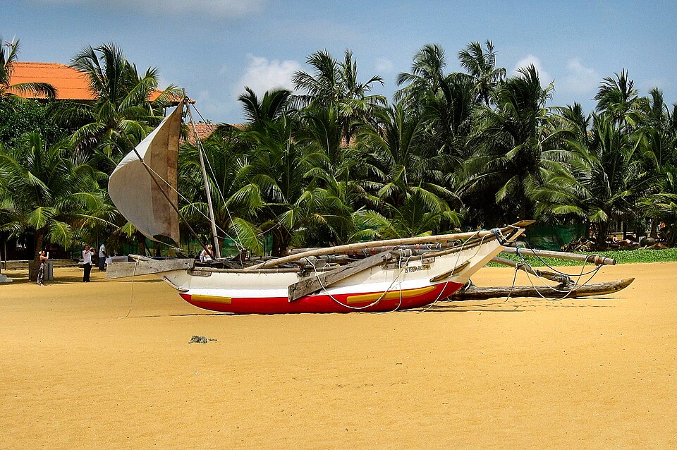 Traditional Sri Lankan fishing boat on the Negombo Lagoon at dawn