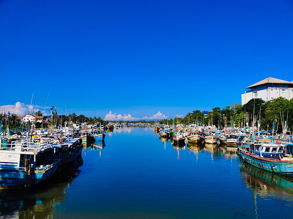 Traditional wooden boats anchored on the Negombo Lagoon, Sri Lanka